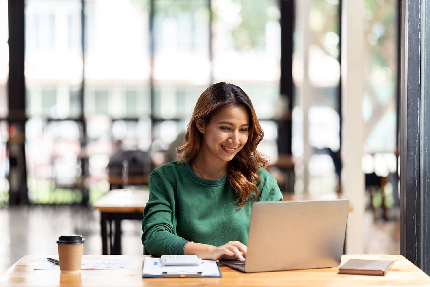 woman working on a laptop in the office